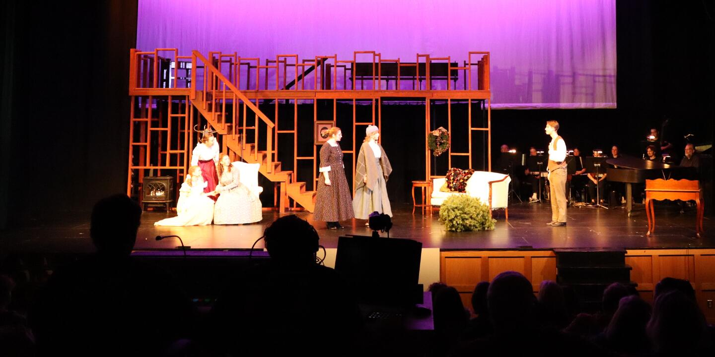 A photo of Oyster River High School students on stage during the March 21 presentation of Little Women the Musical.