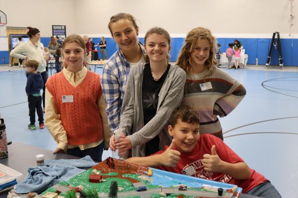 Oyster River Middle School students with their watershed display.