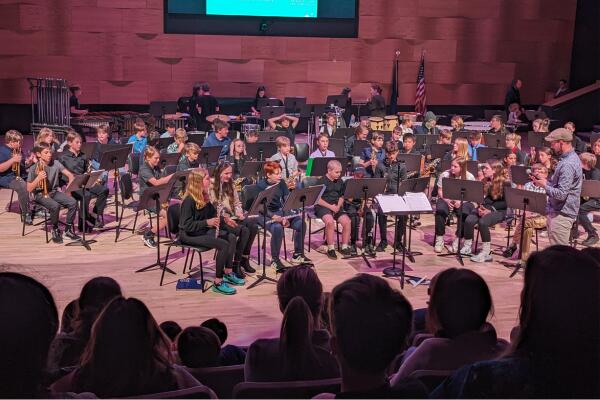Middle school band students during a concert.