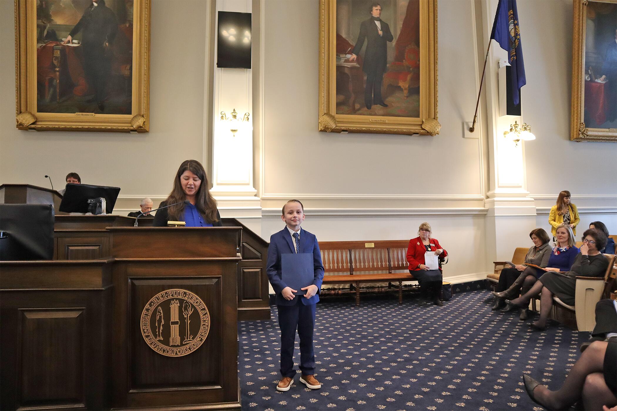 Oyster River Middle School fifth-grader Noah Sanders accepts his certificate of recognition as a 2024 New Hampshire's Kid Executive Councilor. (Photo courtesy Oyster River Cooperative School District)