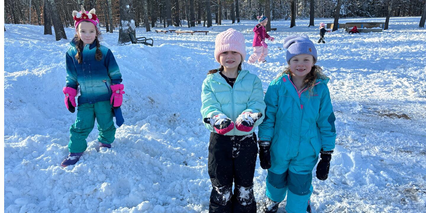 Mast Way Mast Way students dressed in warm winter clothes enjoying fresh snow during recess.